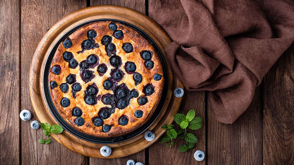 making blueberry cake with best olive oil