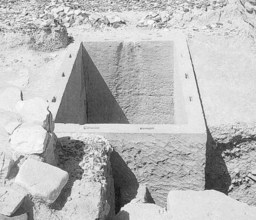 stone tub for pressing of olives from neolithic era Stone tub for the pressing of olives
