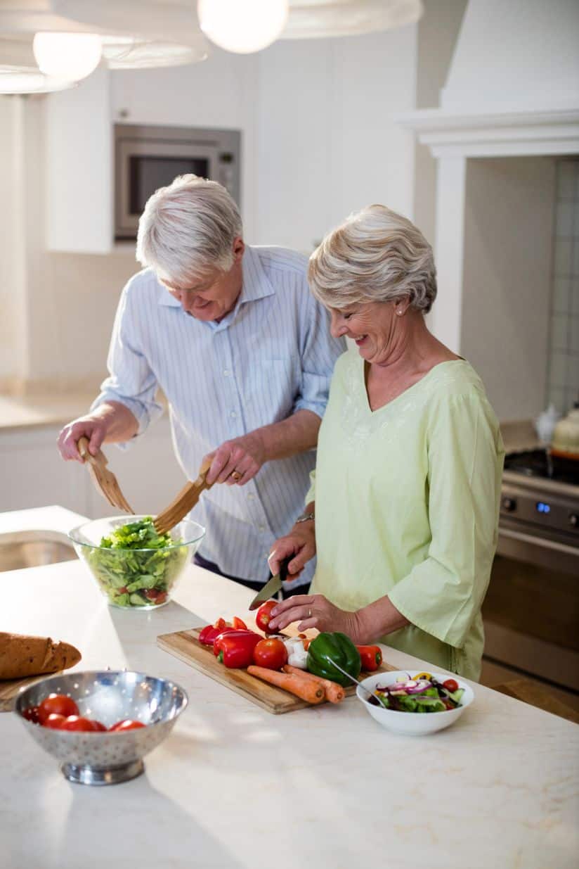 Senior couple enjoys their favorite olive oil